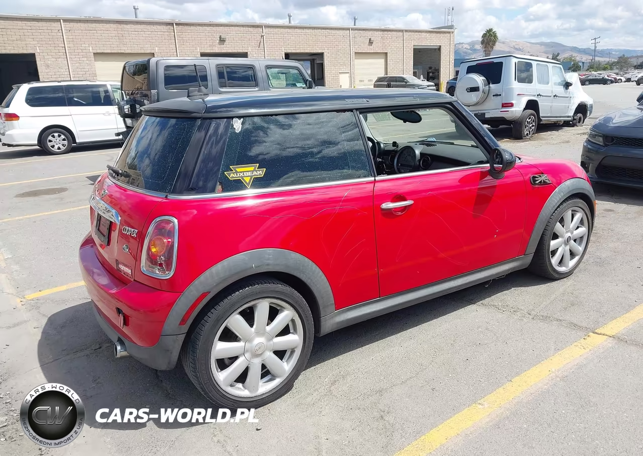 2009 Mini Cooper VIN:WMWMF33549TW73729 - 4