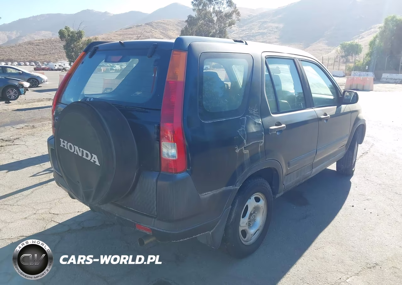 2002 Honda Cr-V Lx VIN:JHLRD685X2C010585 - 4