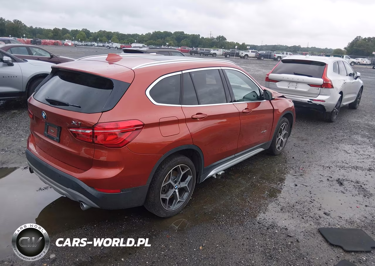 2018 BMW X1 xDrive28I VIN:WBXHT3C32J5L26424 - 4