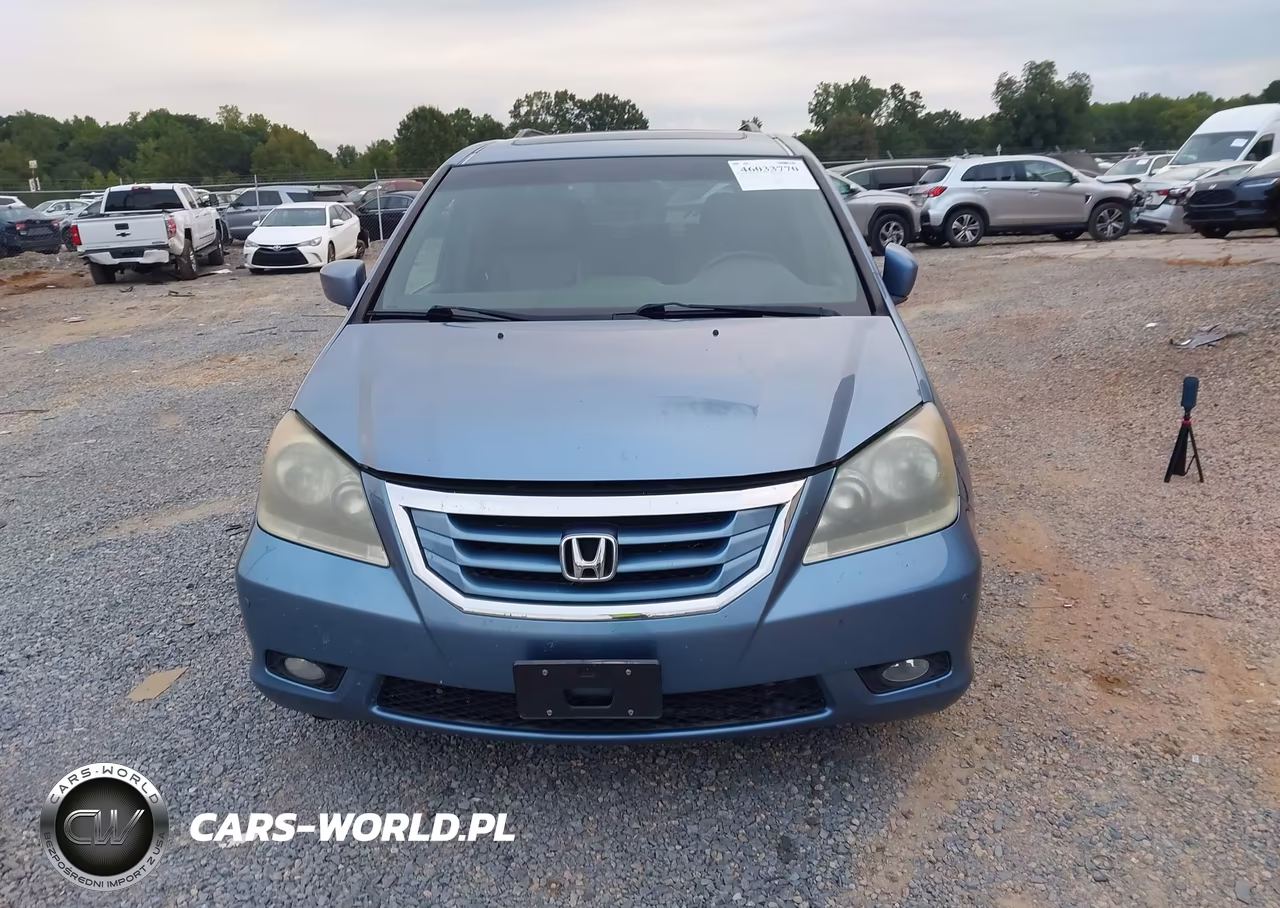 2010 Honda Odyssey Touring VIN:5FNRL3H90AB043727 - 12