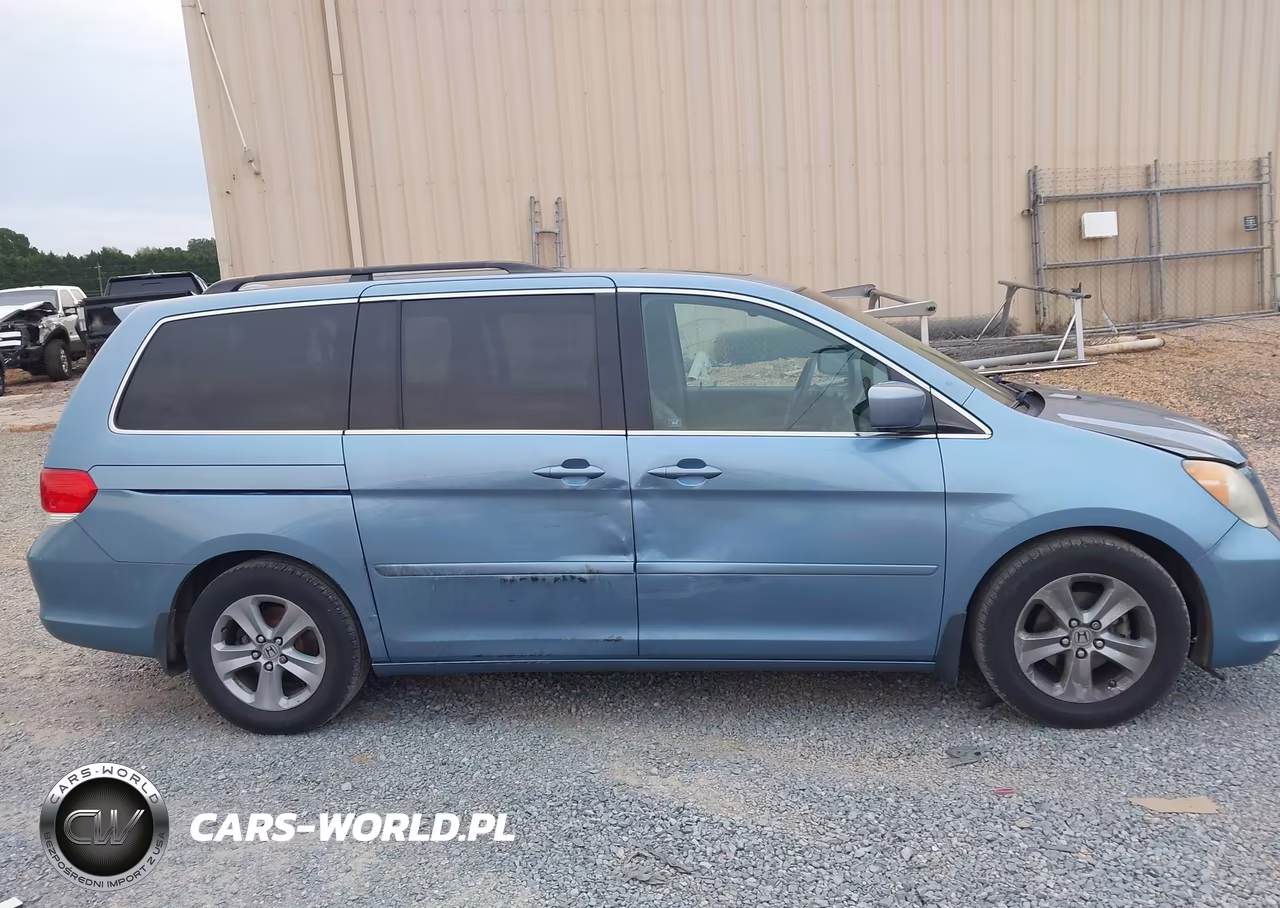 2010 Honda Odyssey Touring VIN:5FNRL3H90AB043727 - 13