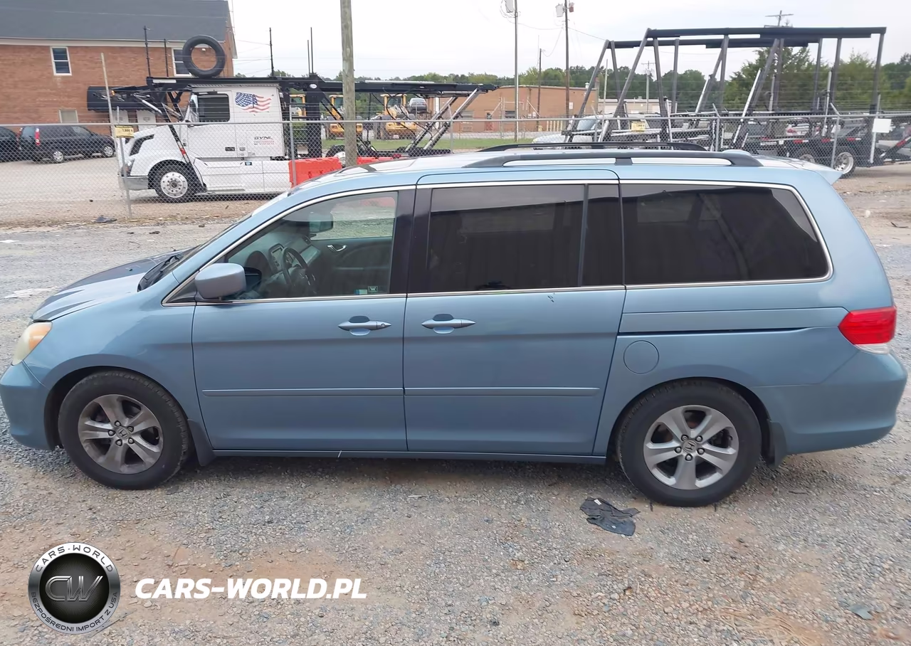 2010 Honda Odyssey Touring VIN:5FNRL3H90AB043727 - 14