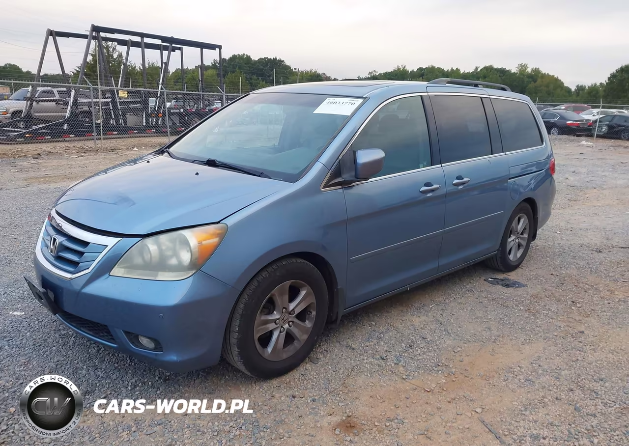 2010 Honda Odyssey Touring VIN:5FNRL3H90AB043727 - 2