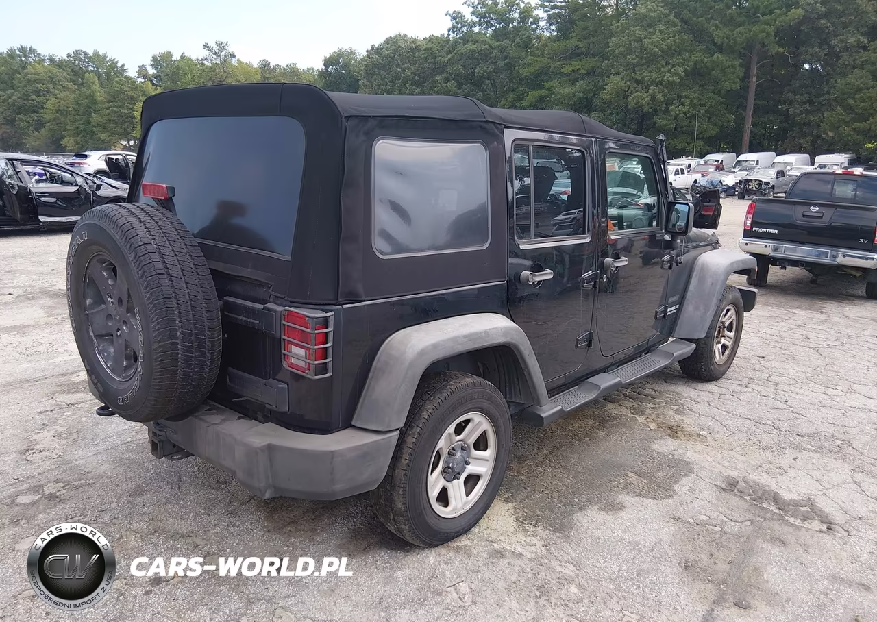 2010 Jeep Wrangler Unlimited Sport VIN:1J4BB3H14AL214467 - 4