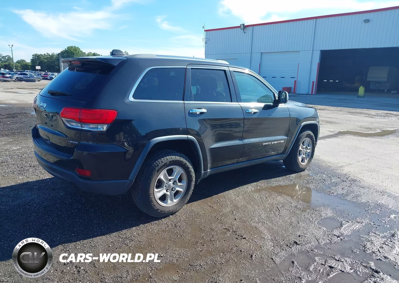 2015 Jeep Grand Cherokee Laredo VIN:1C4RJFAGXFC838093 - 4