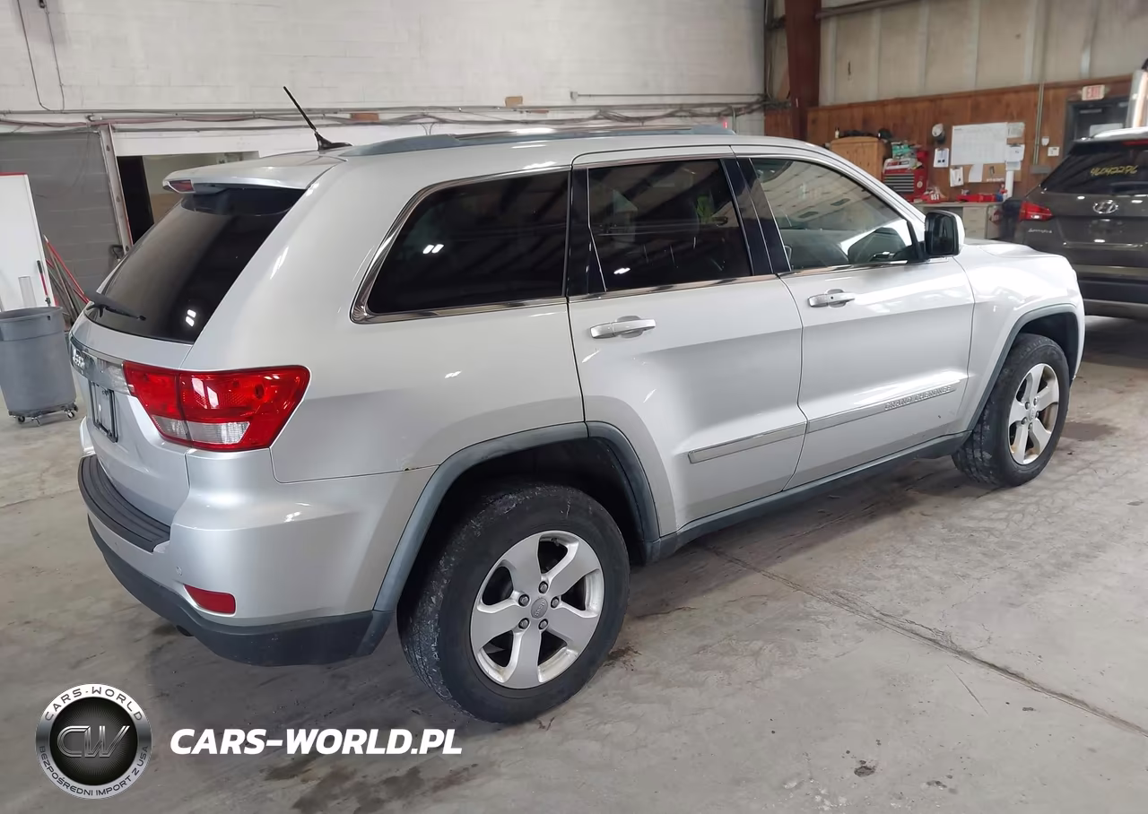 2012 Jeep Grand Cherokee Laredo VIN:1C4RJFAG4CC123385 - 4