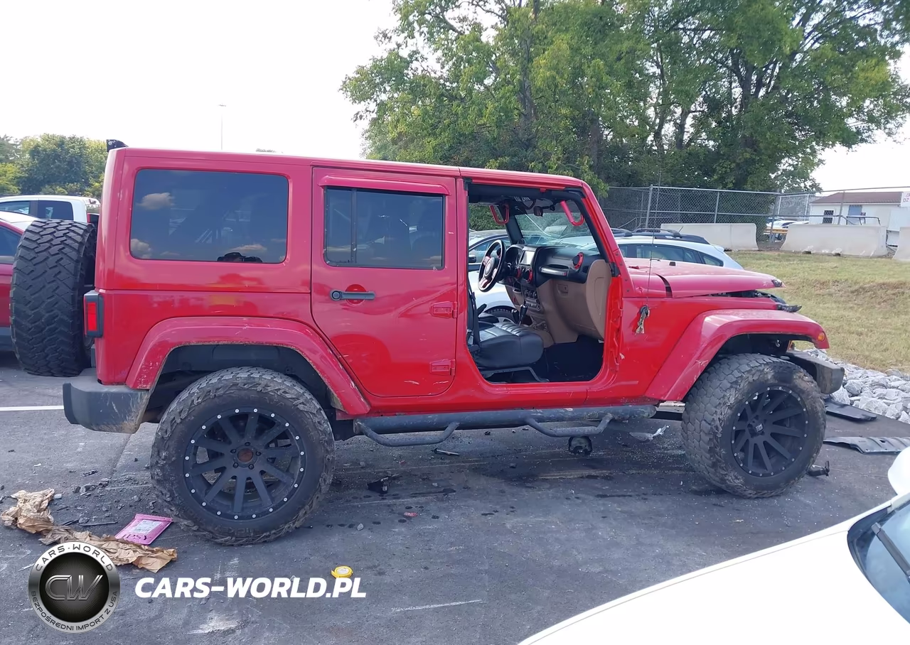 2011 Jeep Wrangler Unlimited Sahara VIN:1J4BA5H13BL577083 - 14