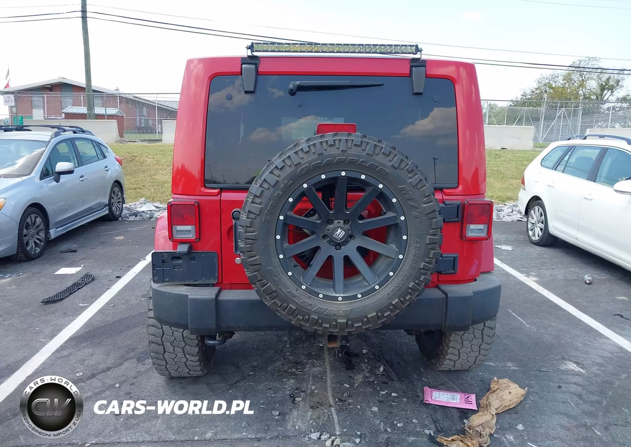 2011 Jeep Wrangler Unlimited Sahara VIN:1J4BA5H13BL577083 - 17