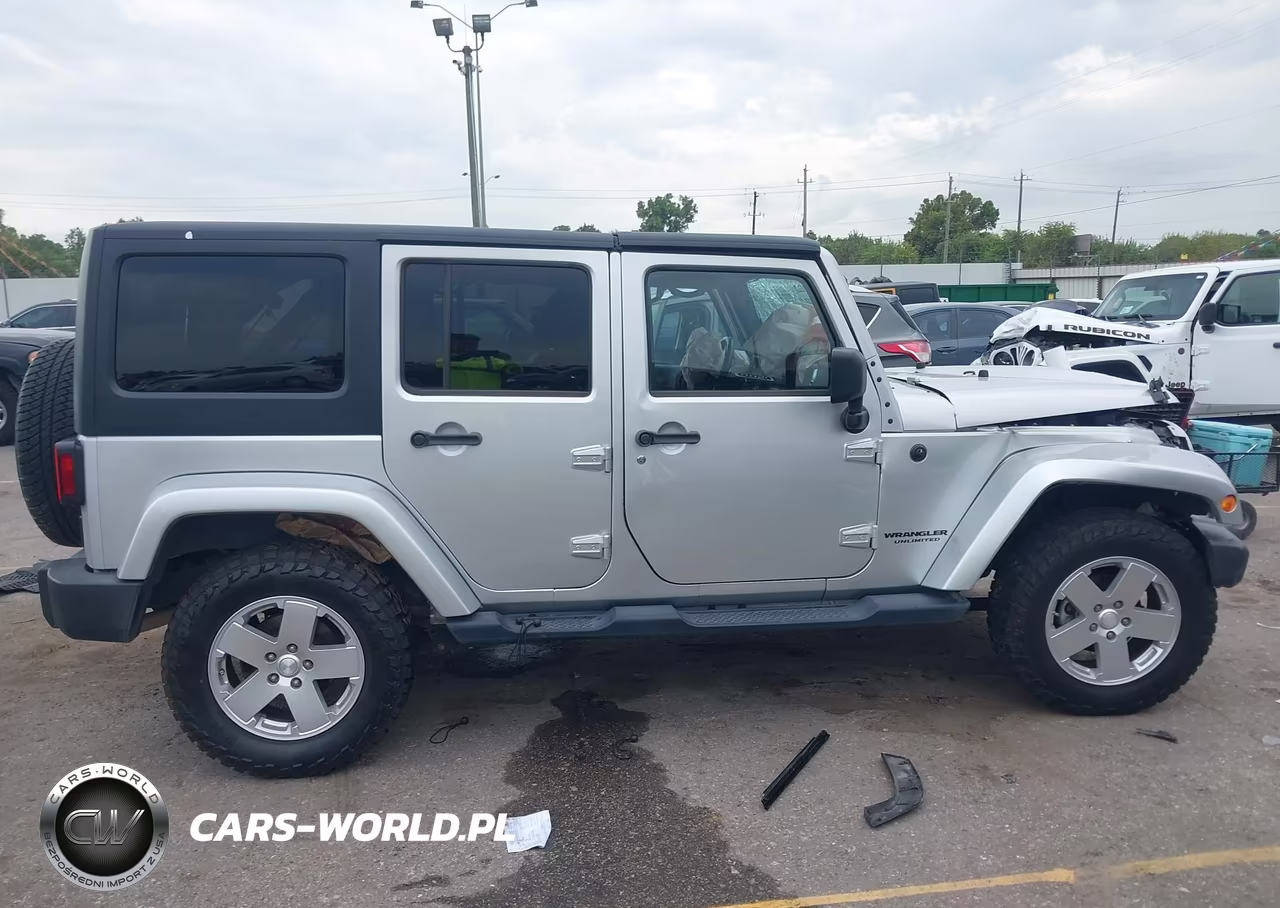 2012 Jeep Wrangler Unlimited Sahara VIN:1C4HJWEG1CL168421 - 13