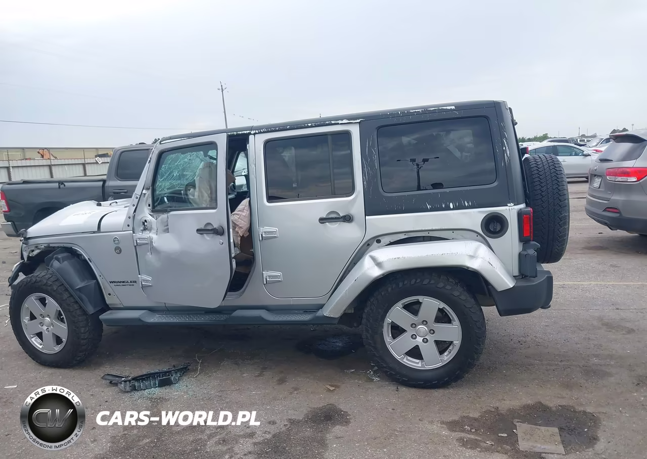 2012 Jeep Wrangler Unlimited Sahara VIN:1C4HJWEG1CL168421 - 14
