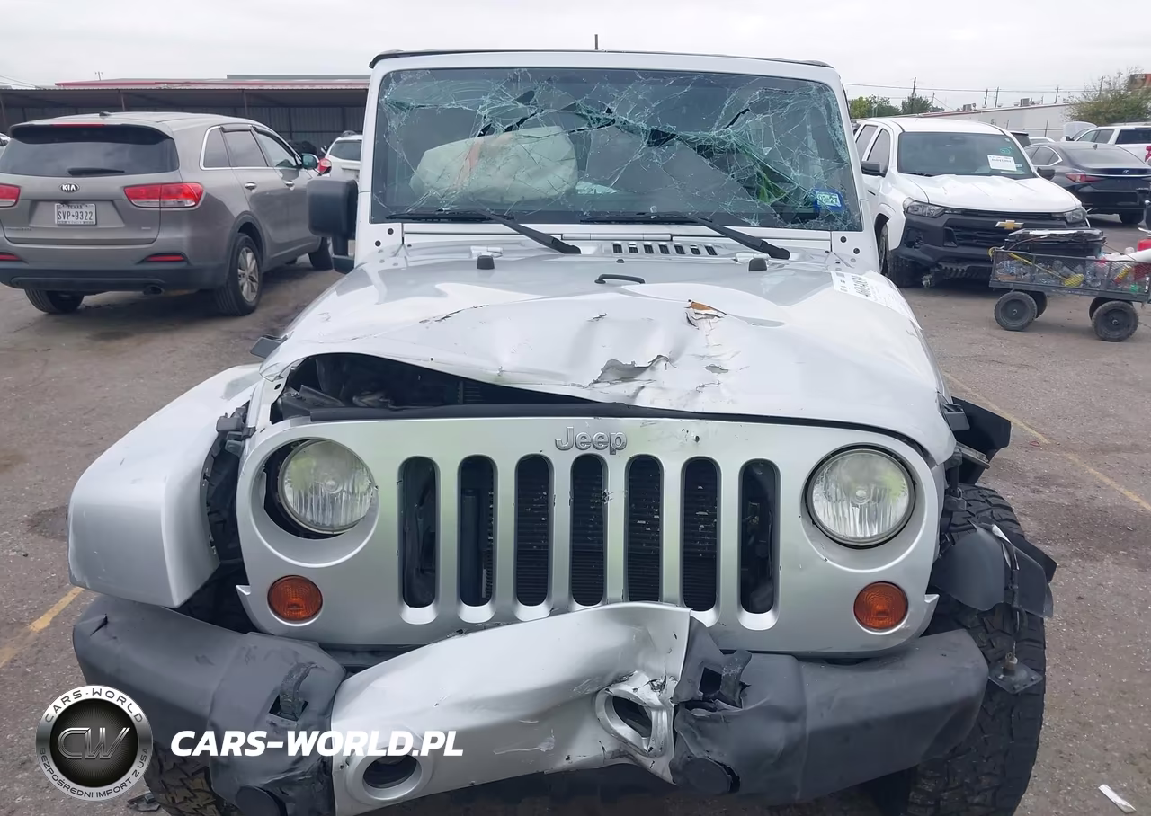2012 Jeep Wrangler Unlimited Sahara VIN:1C4HJWEG1CL168421 - 6