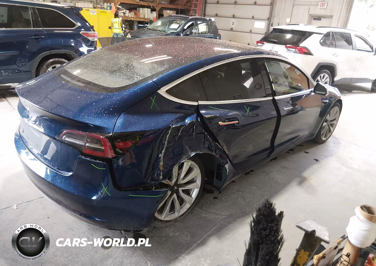 2018 Tesla Model 3 Long Range-Mid Range VIN:5YJ3E1EA1JF042699 - 4