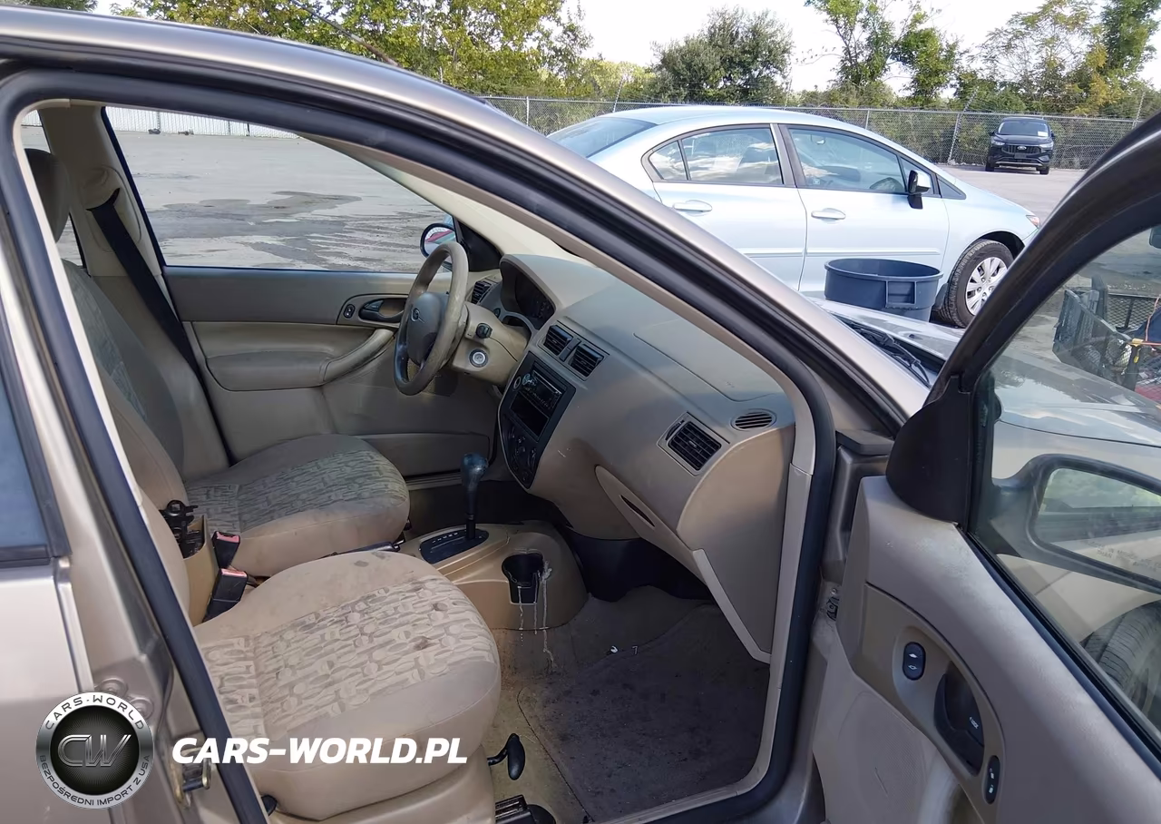 2005 Ford Focus VIN:1FAPP34N05W197937 - 4