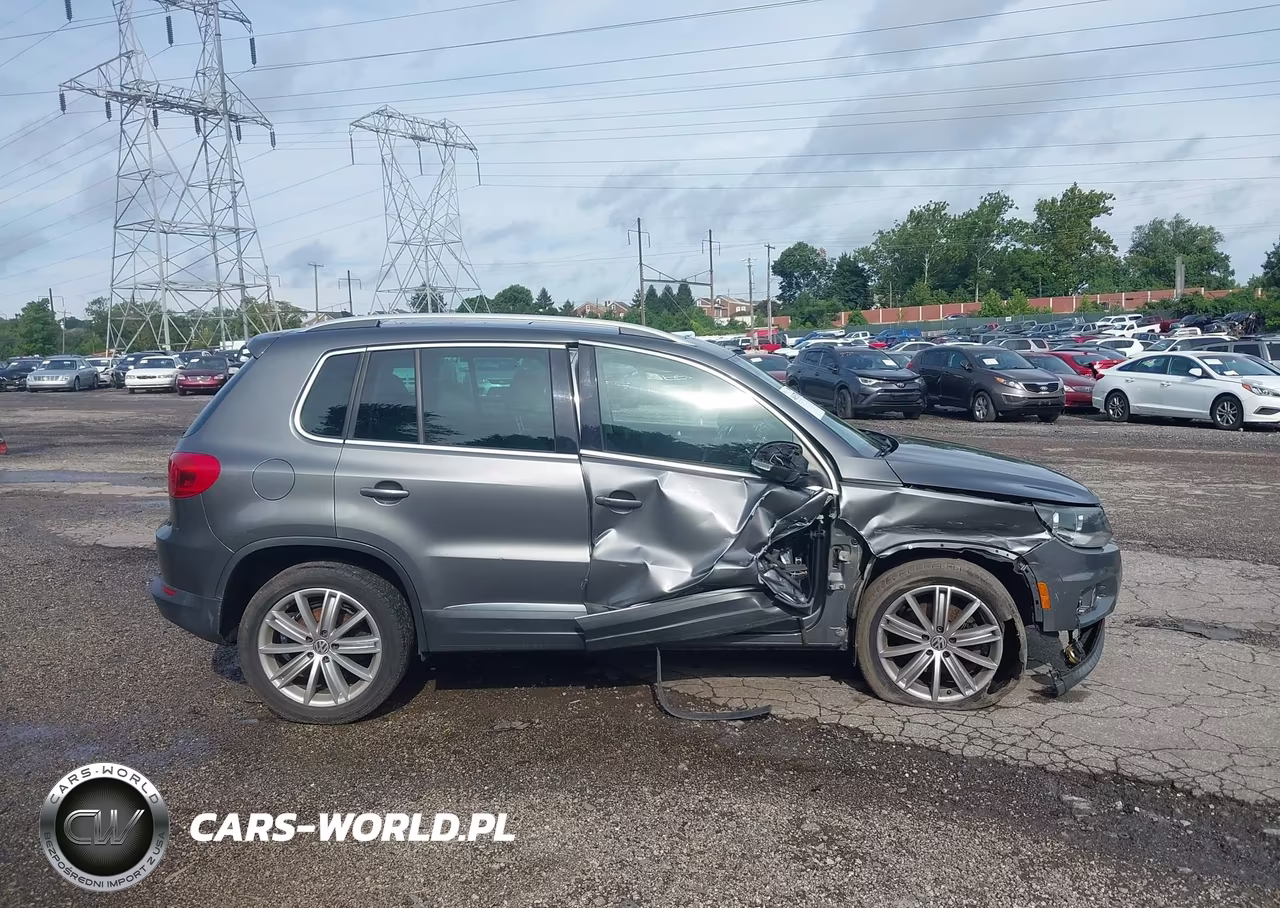 2014 Volkswagen Tiguan Sel VIN:WVGAV3AX6EW592801 - 13