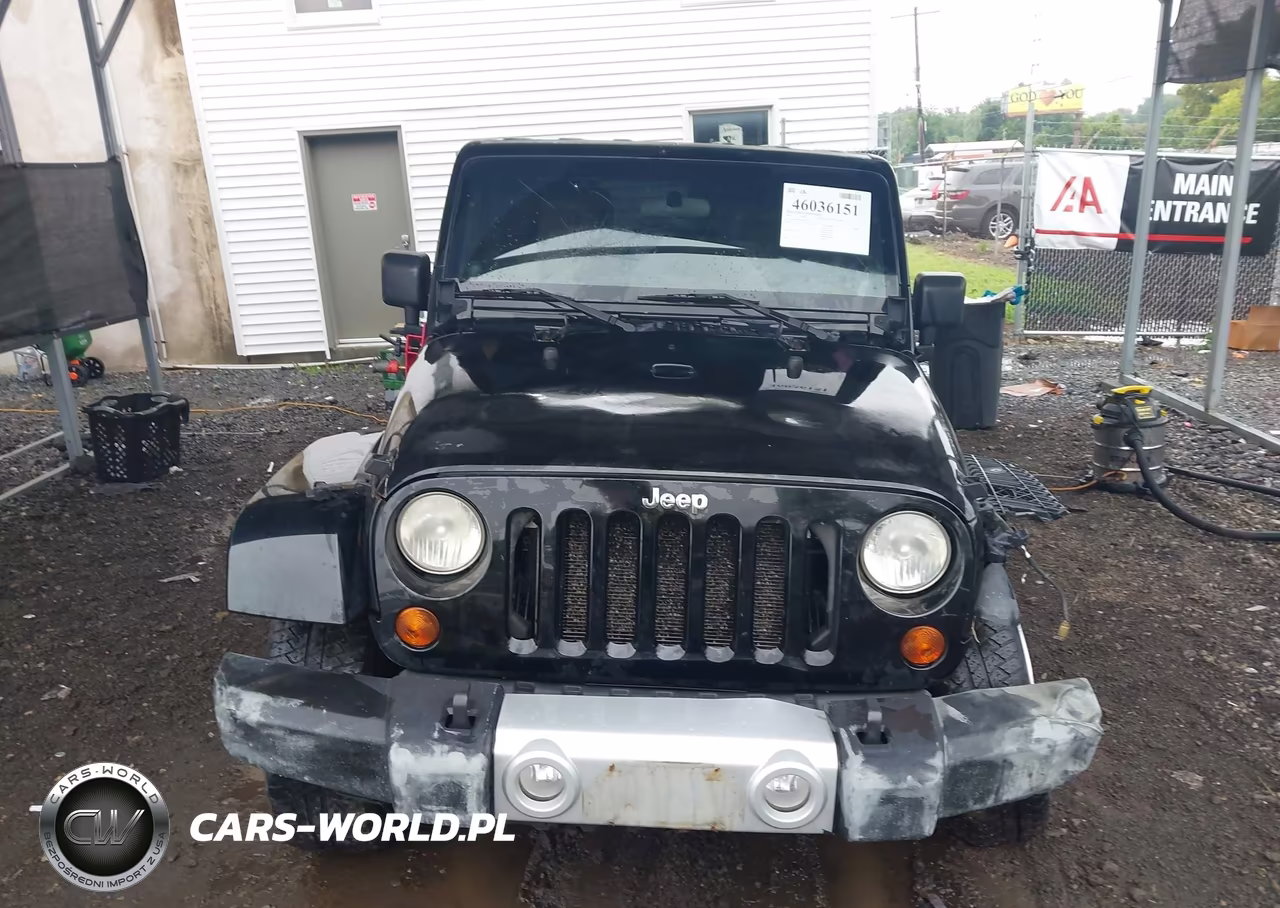 2011 Jeep Wrangler Unlimited Sahara VIN:1J4BA5H10BL524812 - 12