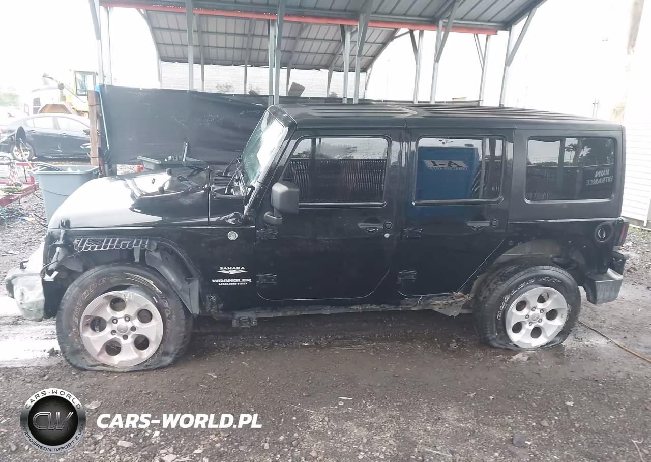 2011 Jeep Wrangler Unlimited Sahara VIN:1J4BA5H10BL524812 - 14