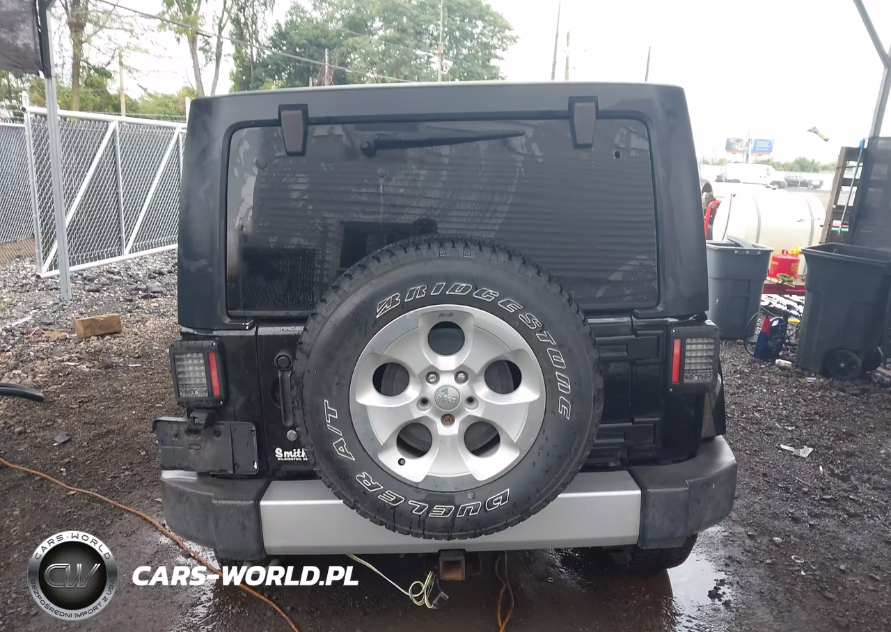 2011 Jeep Wrangler Unlimited Sahara VIN:1J4BA5H10BL524812 - 16