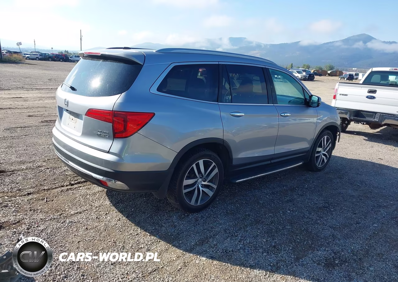2016 Honda Pilot Elite VIN:5FNYF6H03GB040058 - 4