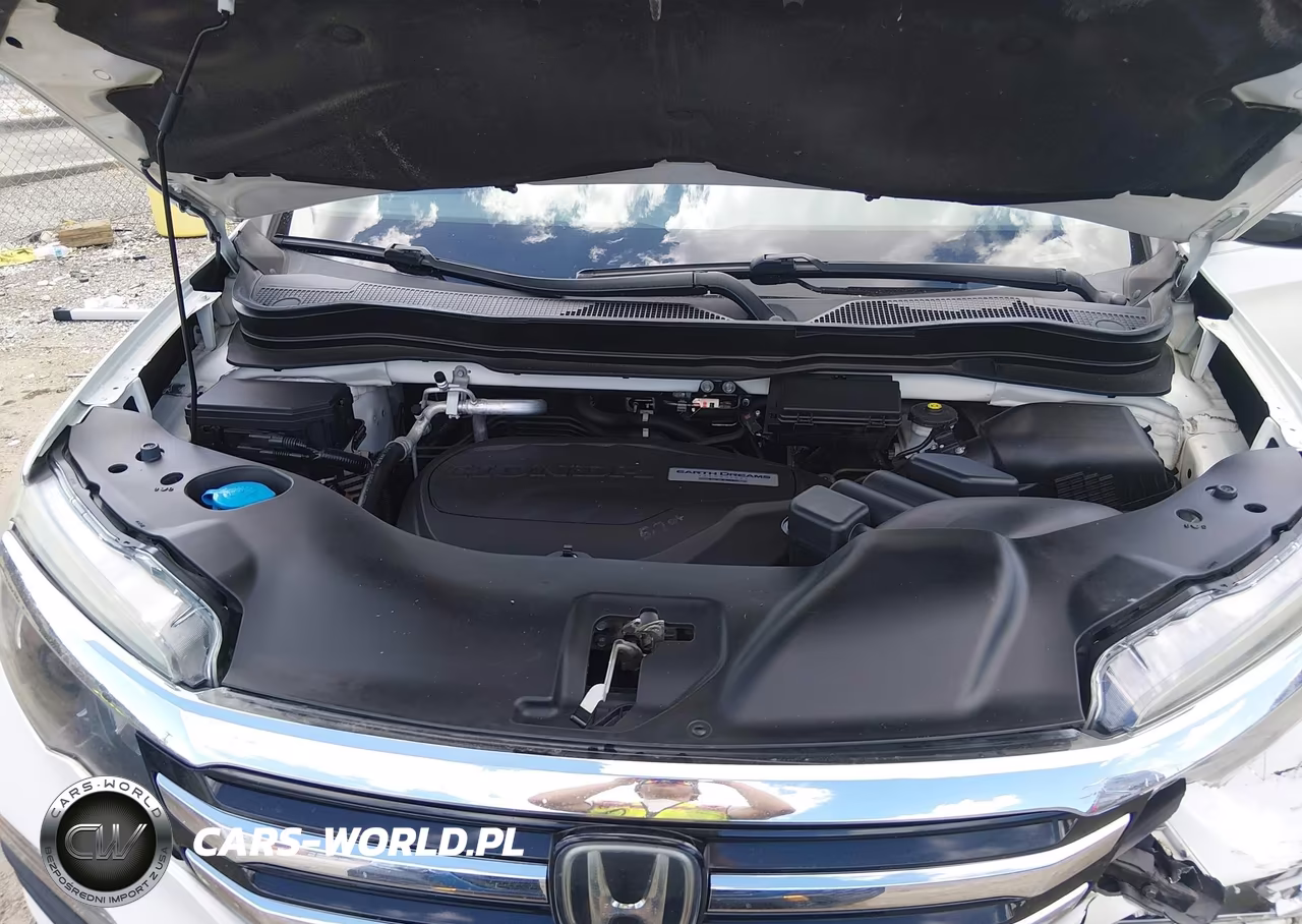2018 Honda Pilot Elite VIN:5FNYF6H06JB069514 - 10