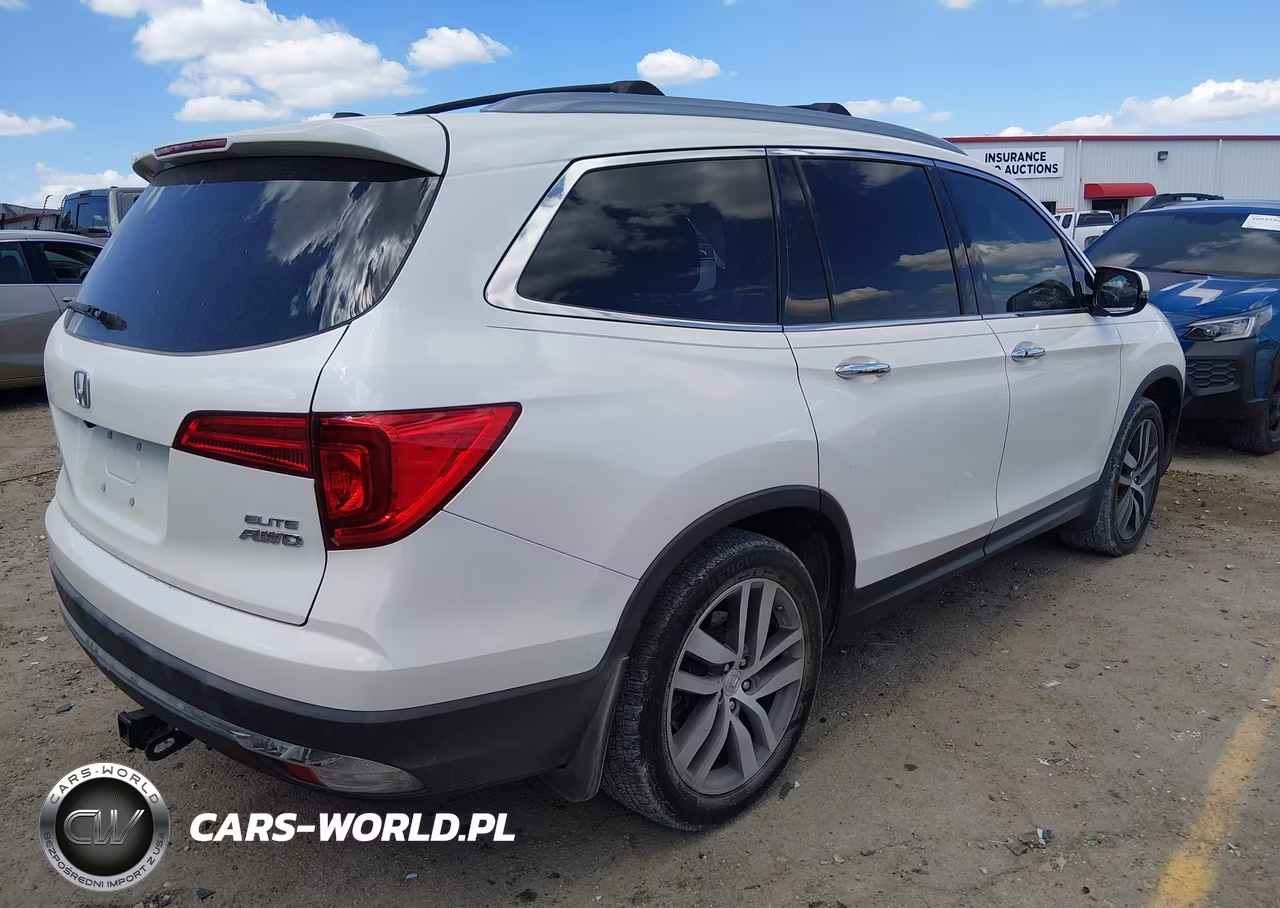 2018 Honda Pilot Elite VIN:5FNYF6H06JB069514 - 4