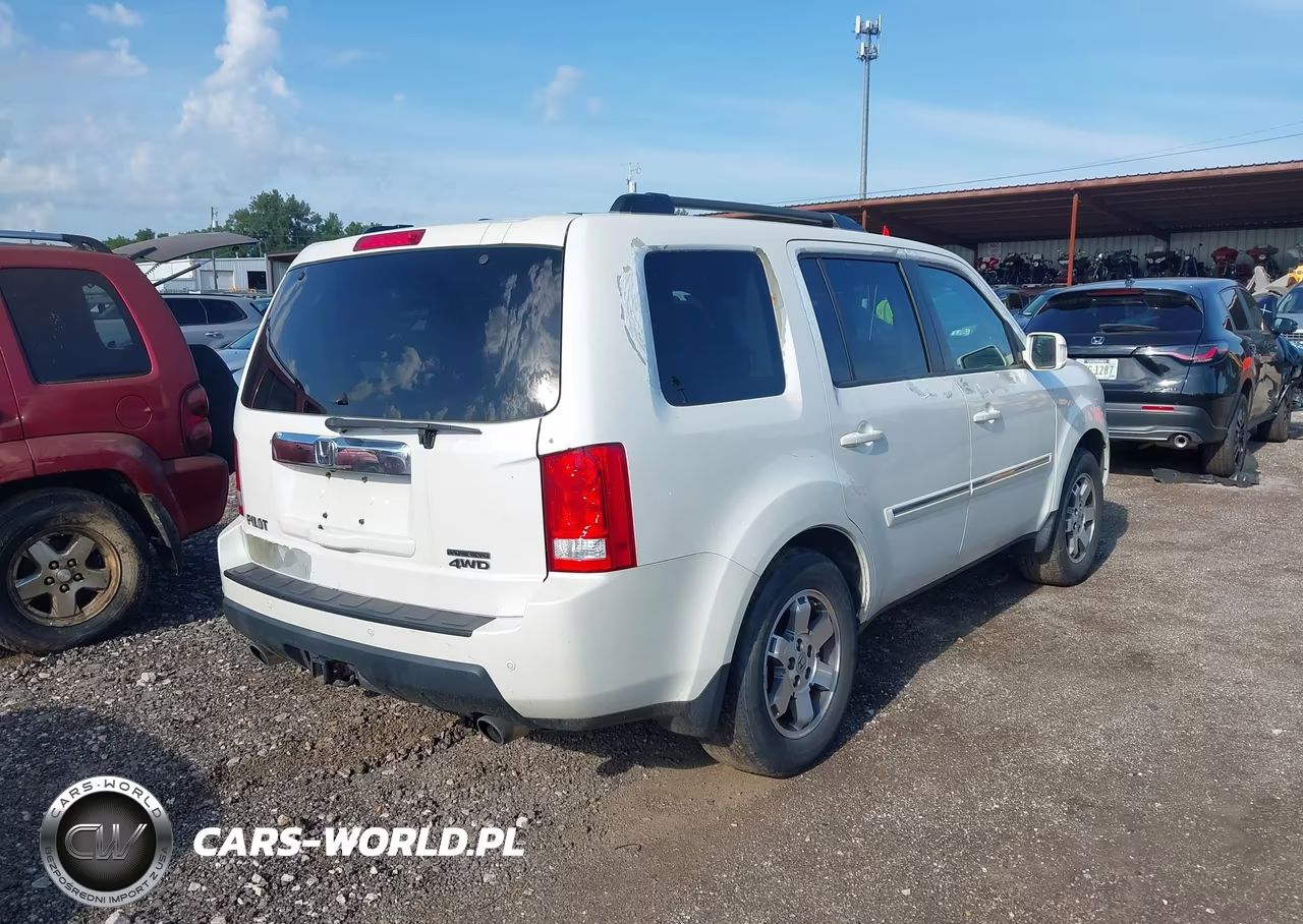 2011 Honda Pilot Touring VIN:5FNYF4H97BB061068 - 4