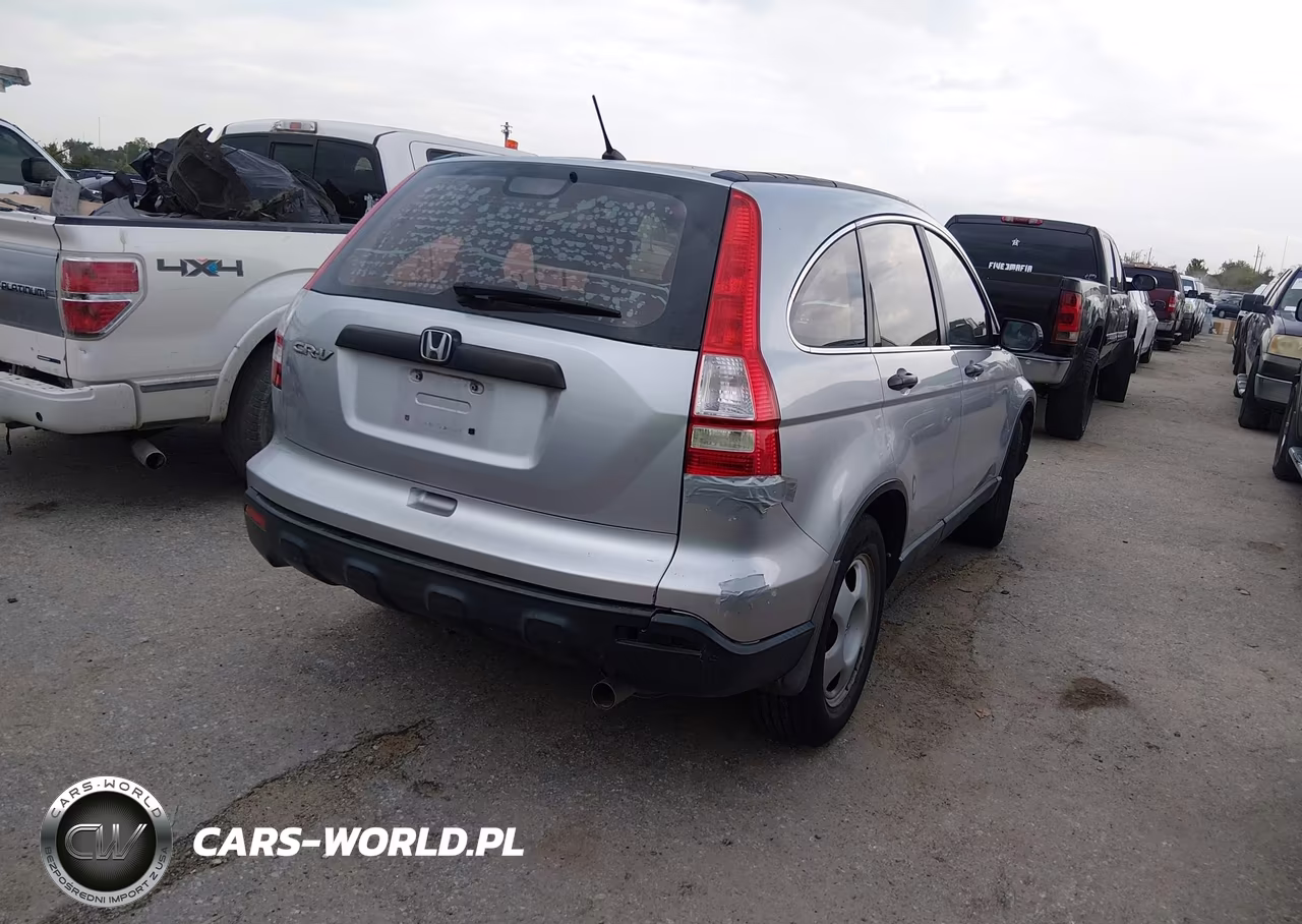 2009 Honda Cr-V Lx VIN:3CZRE383X9G702631 - 4