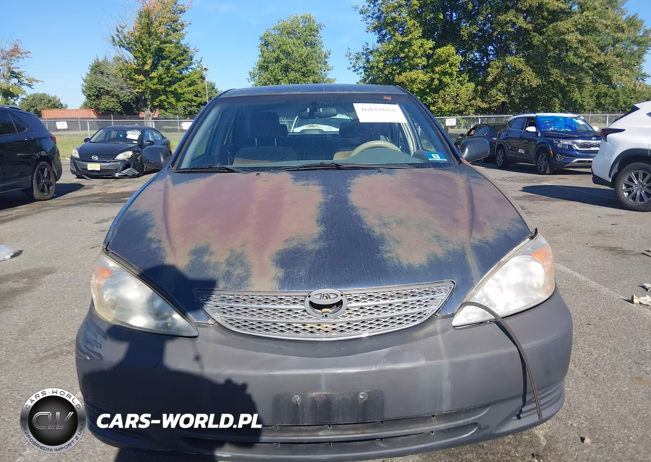 2002 Toyota Camry Le VIN:4T1BE32K42U518386 - 12