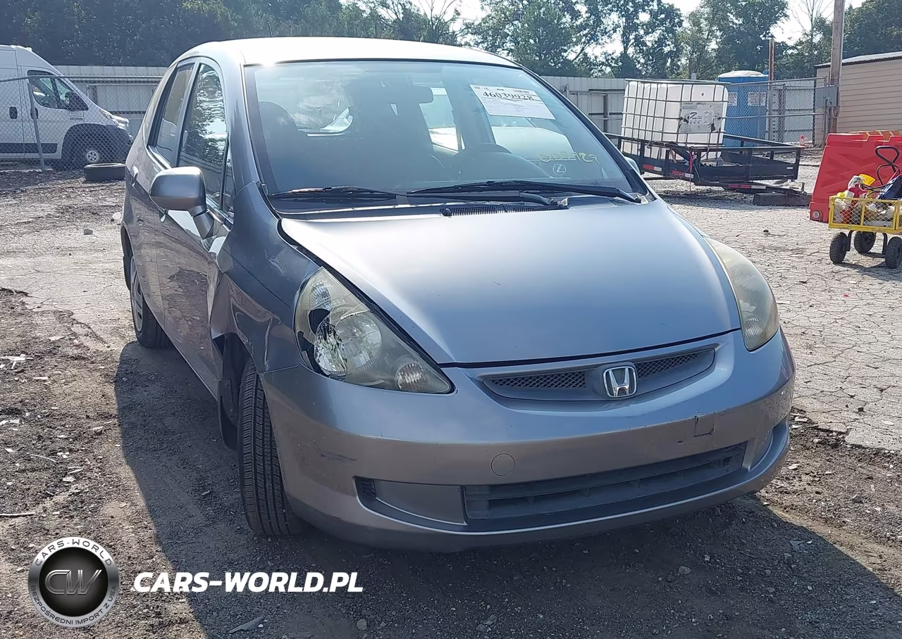 2007 Honda Fit VIN:JHMGD38437S009929 - 12
