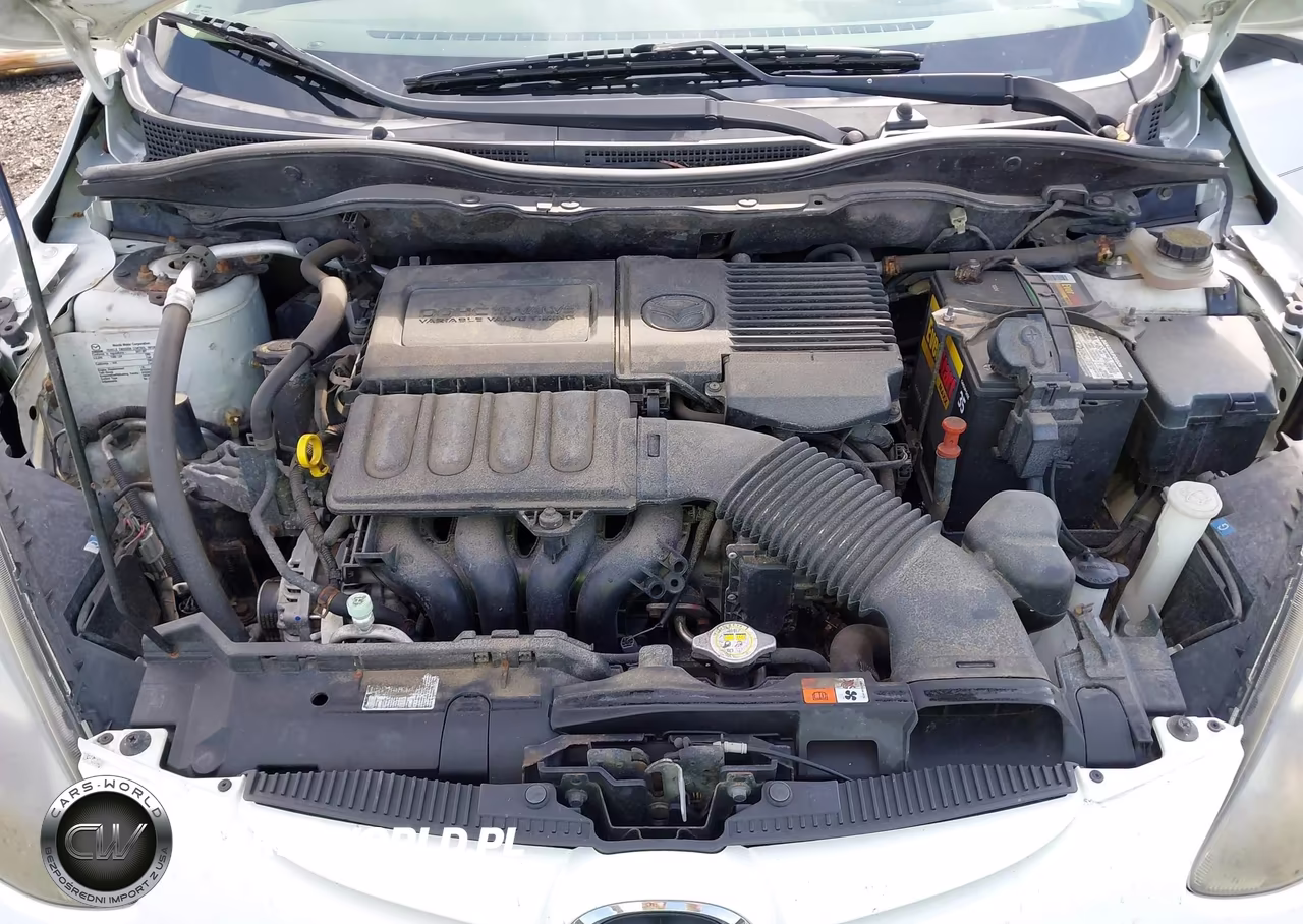2011 Mazda Mazda2 Sport VIN:JM1DE1HYXB0105554 - 10