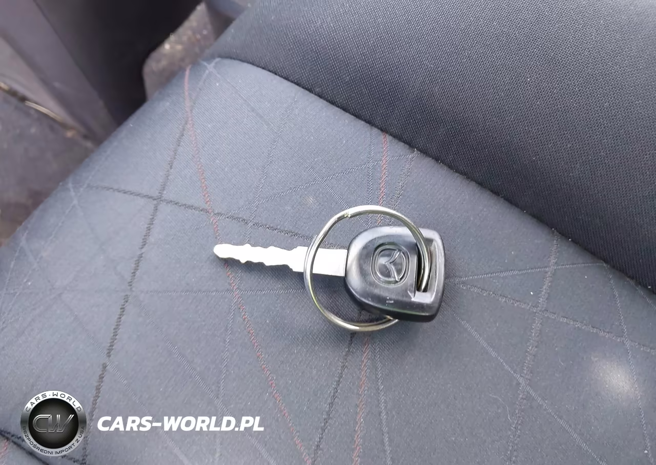 2011 Mazda Mazda2 Sport VIN:JM1DE1HYXB0105554 - 11