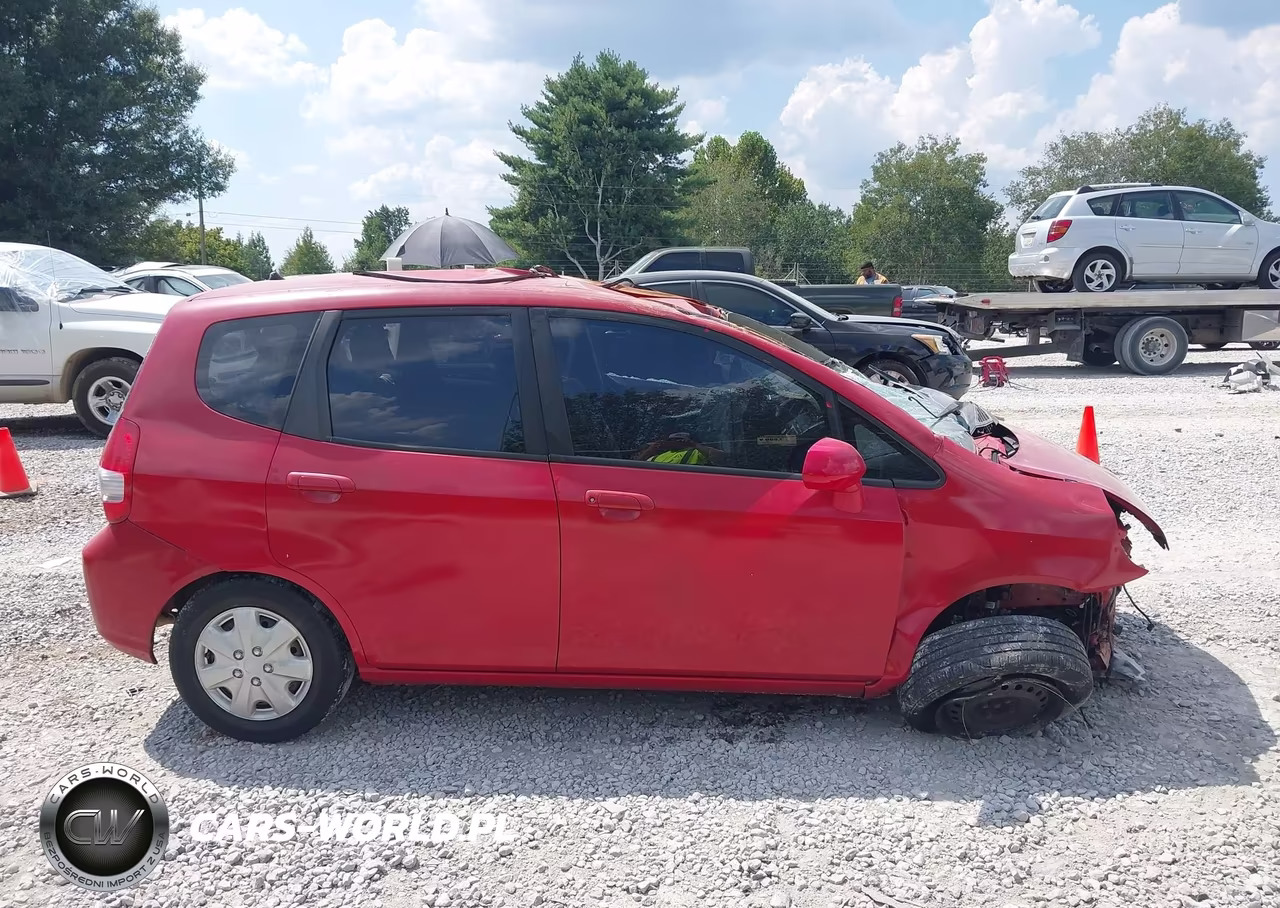 2007 Honda Fit VIN:JHMGD38447S061151 - 12
