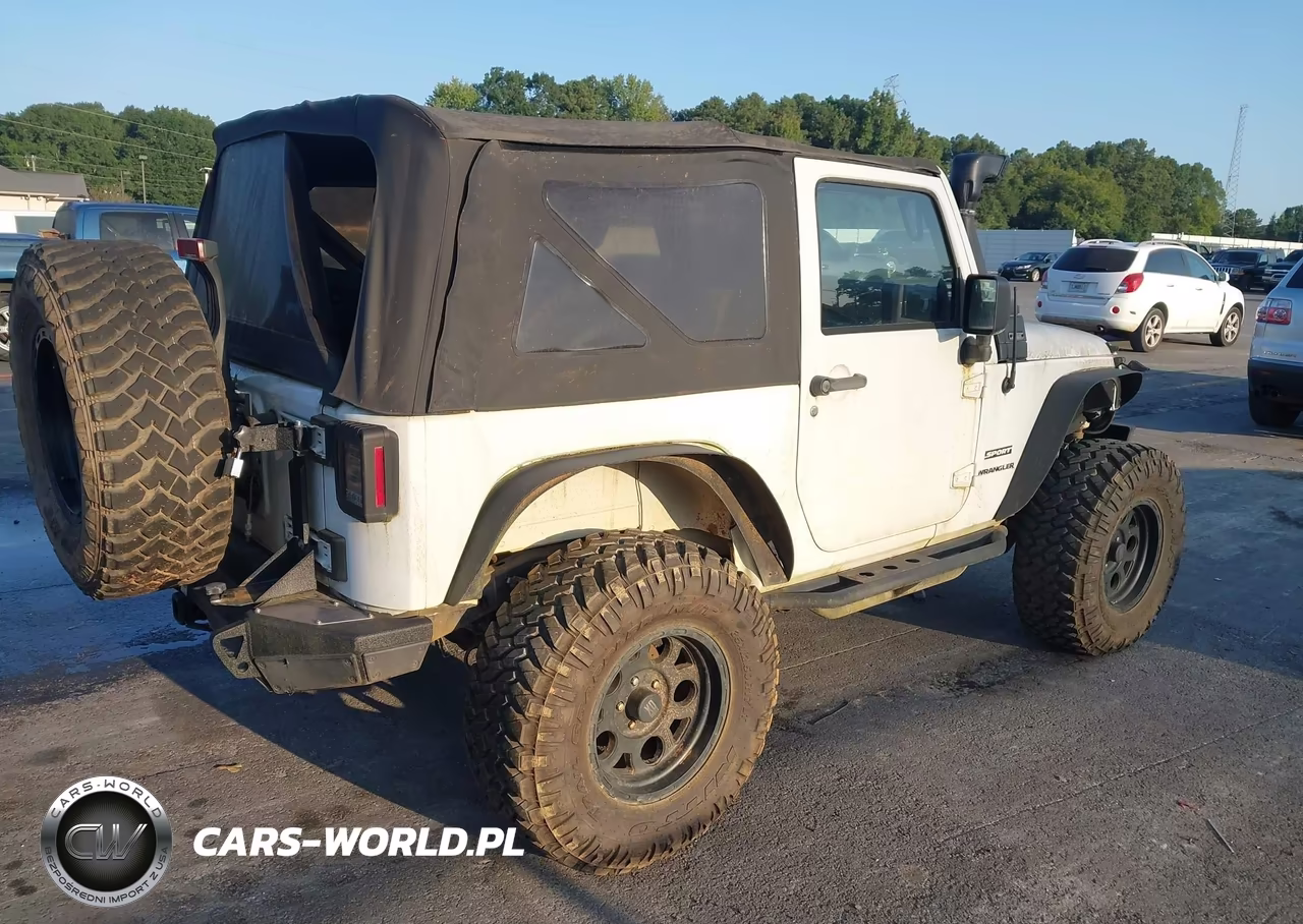 2012 Jeep Wrangler Sport VIN:1C4AJWAG9CL101217 - 4