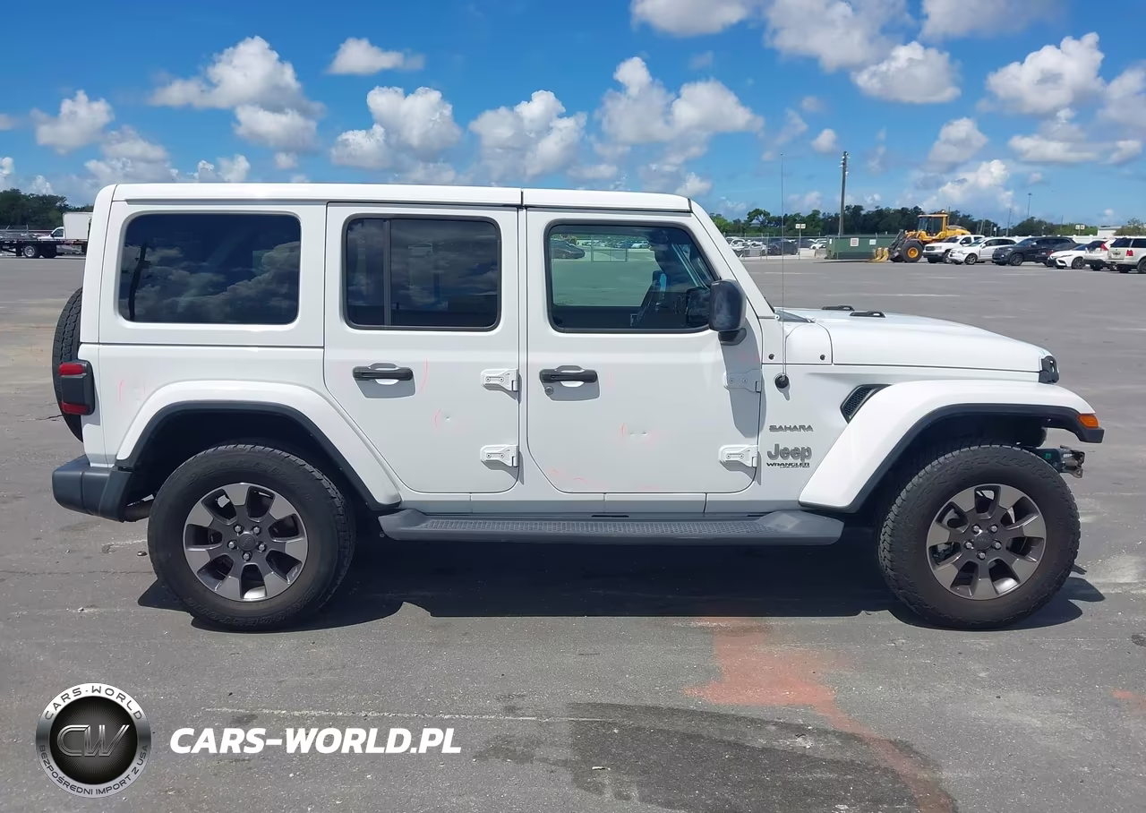 2019 Jeep Wrangler Unlimited Sahara 4X4 VIN:1C4HJXEN9KW509615 - 13