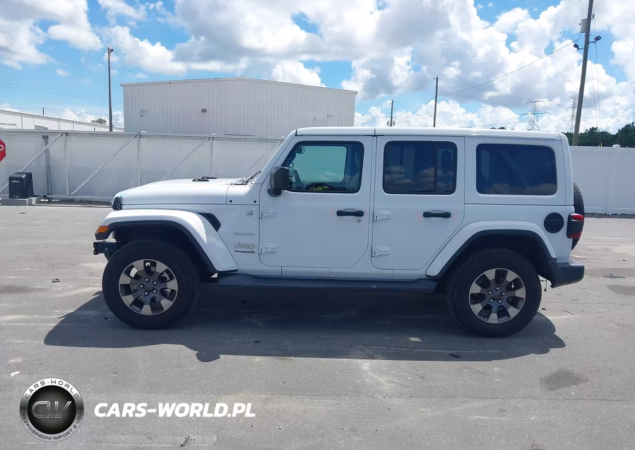 2019 Jeep Wrangler Unlimited Sahara 4X4 VIN:1C4HJXEN9KW509615 - 14