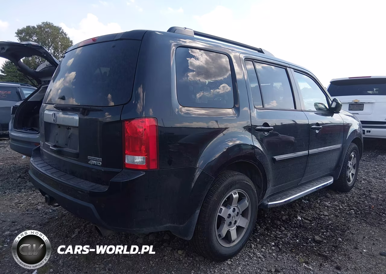 2011 Honda Pilot Touring VIN:5FNYF4H90BB103001 - 4