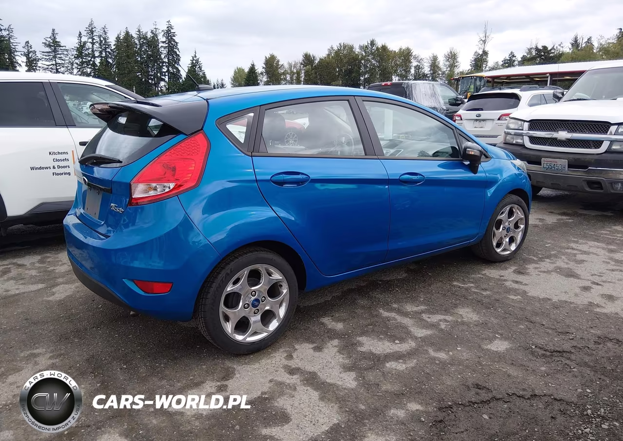 2013 Ford Fiesta Titanium VIN:3FADP4FJ2DM205767 - 4