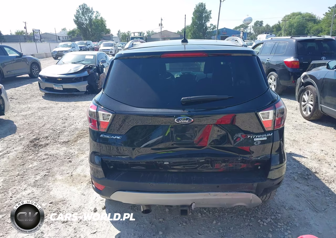 2017 Ford Escape Titanium VIN:1FMCU0J92HUB97624 - 16