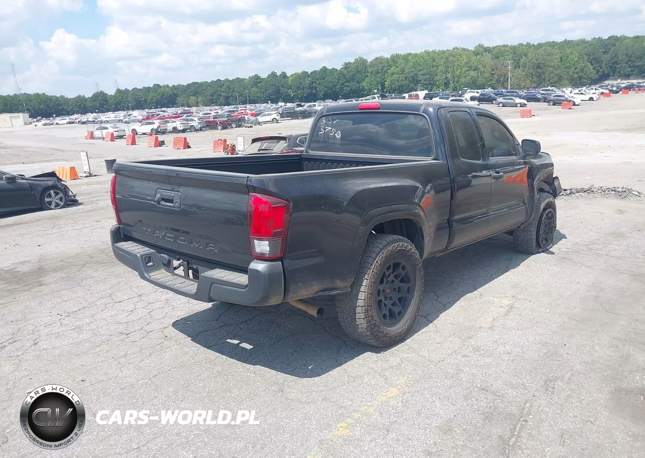2018 Toyota Tacoma Sr VIN:5TFRX5GN5JX103750 - 4