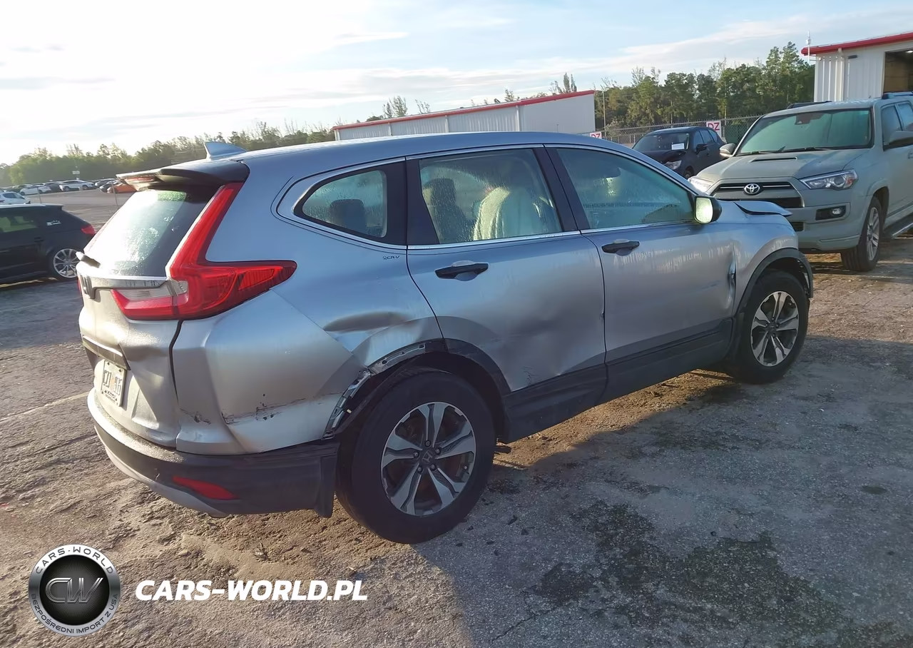 2019 Honda Cr-V Lx VIN:2HKRW5H36KH416111 - 4