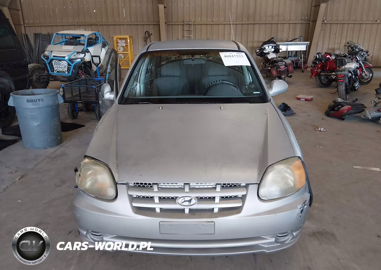 2005 Hyundai Accent Gls VIN:KMHCG45CX5U656883 - 12