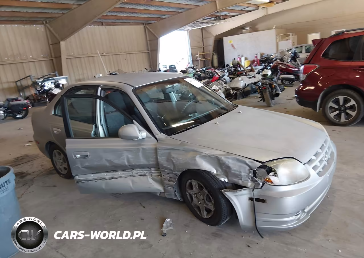 2005 Hyundai Accent Gls VIN:KMHCG45CX5U656883 - 13