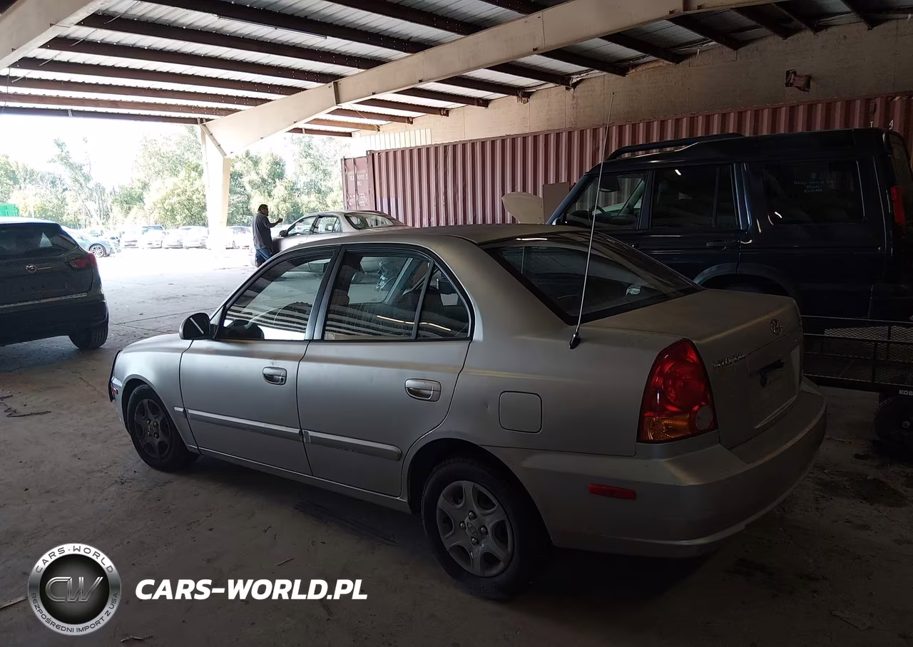 2005 Hyundai Accent Gls VIN:KMHCG45CX5U656883 - 14