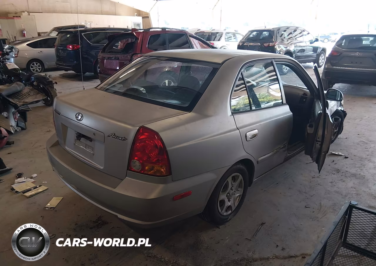 2005 Hyundai Accent Gls VIN:KMHCG45CX5U656883 - 4