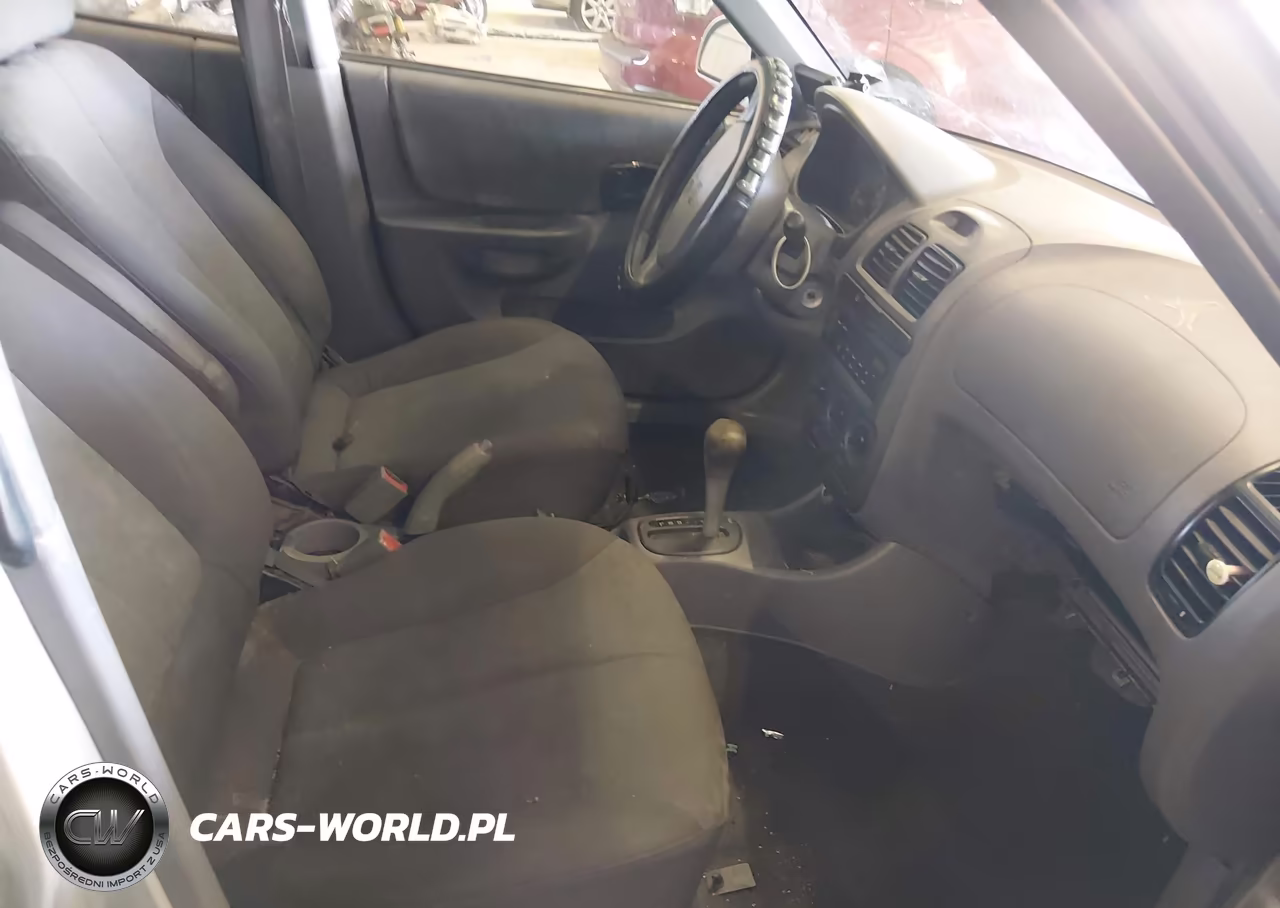 2005 Hyundai Accent Gls VIN:KMHCG45CX5U656883 - 5