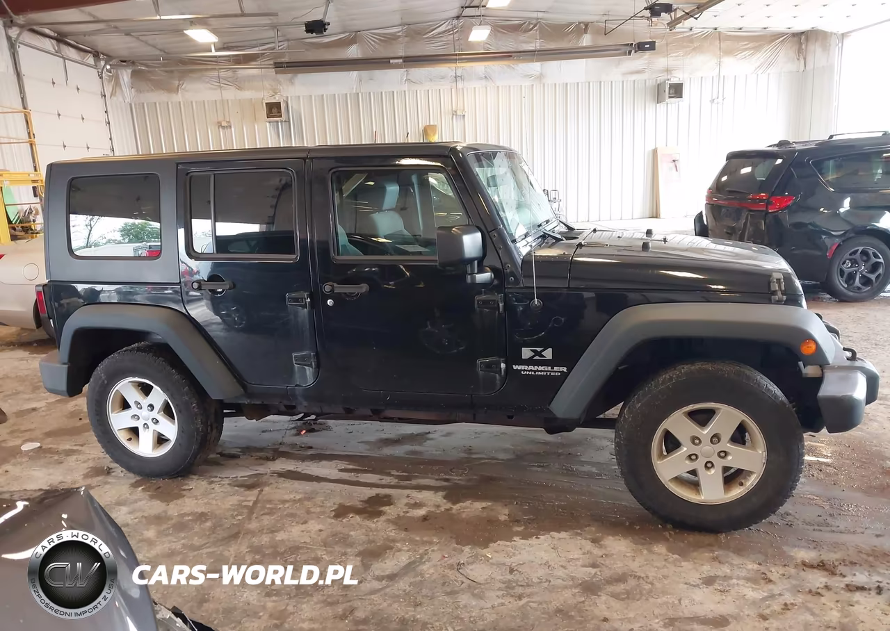 2009 Jeep Wrangler Unlimited X VIN:1J4GA39129L749199 - 13