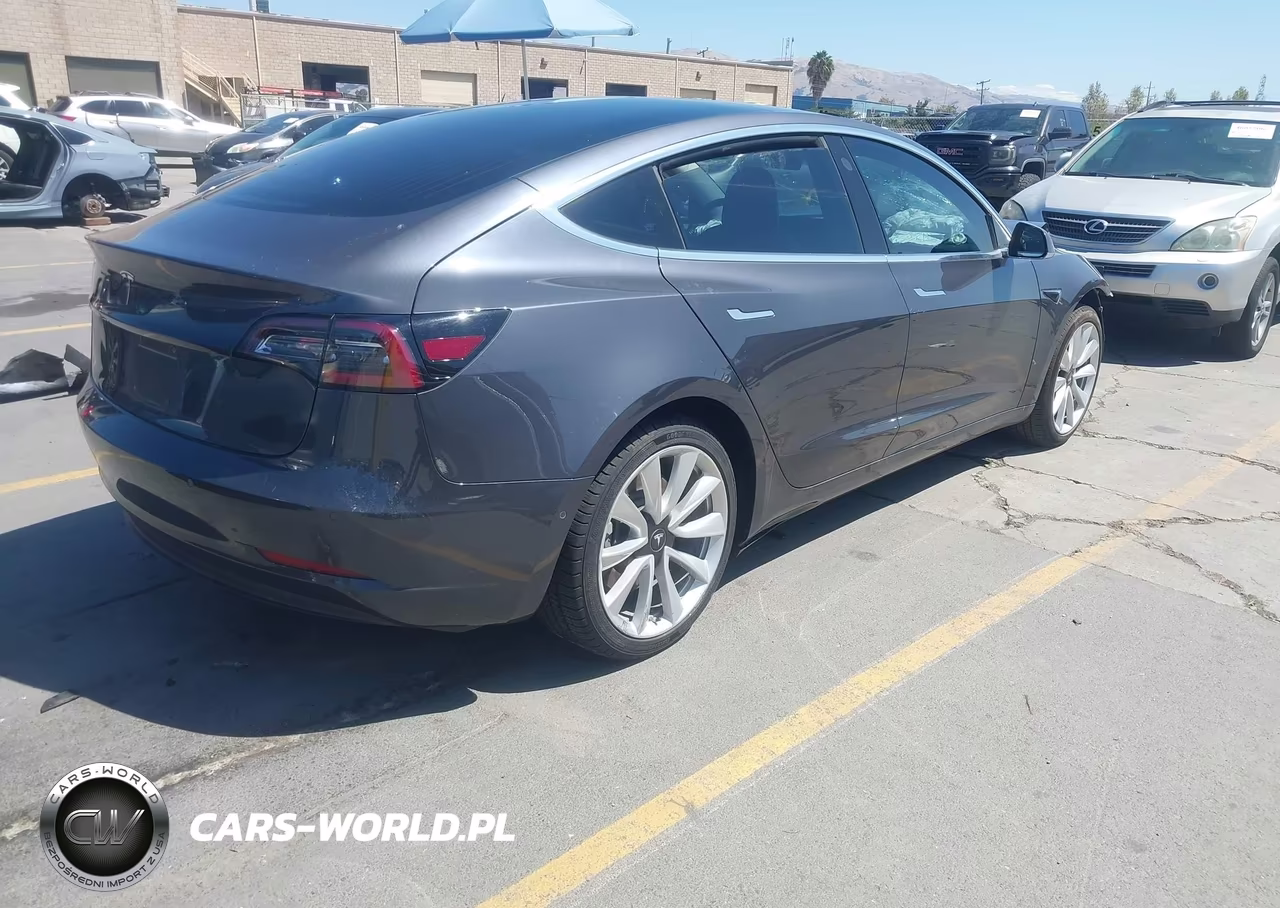 2018 Tesla Model 3 Long Range-Mid Range VIN:5YJ3E1EA6JF163163 - 4