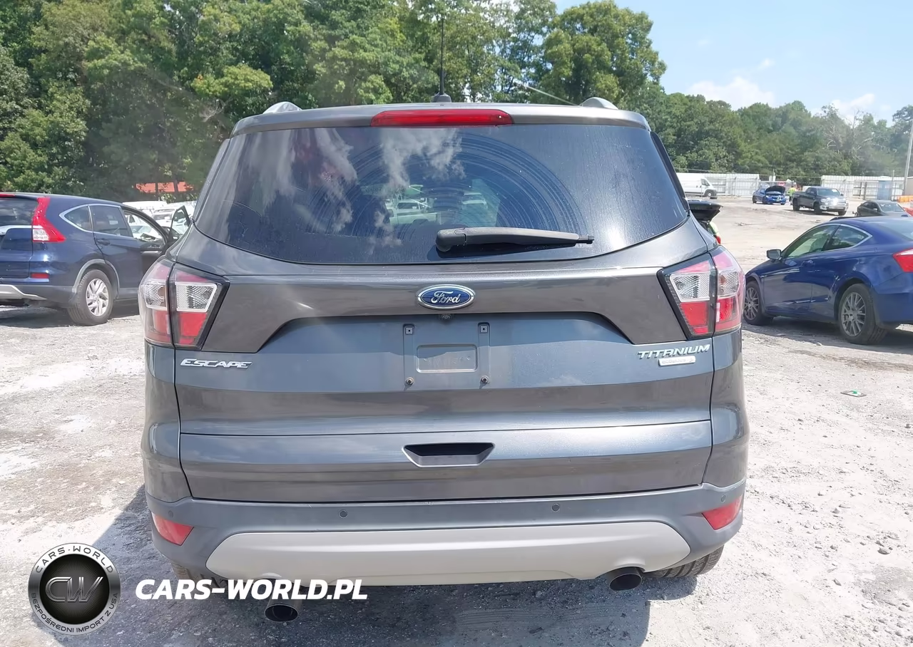 2017 Ford Escape Titanium VIN:1FMCU0JD9HUD06679 - 16