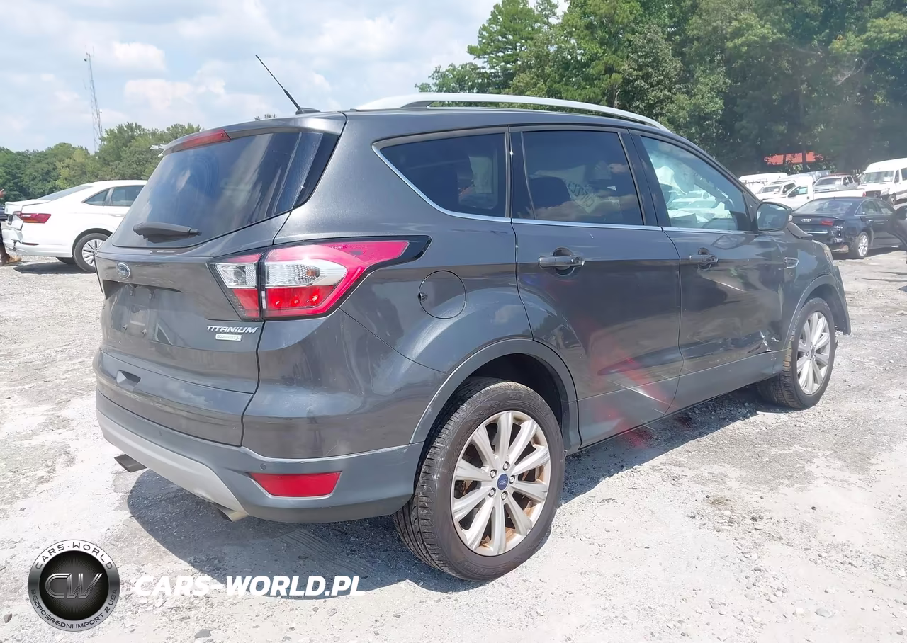 2017 Ford Escape Titanium VIN:1FMCU0JD9HUD06679 - 4