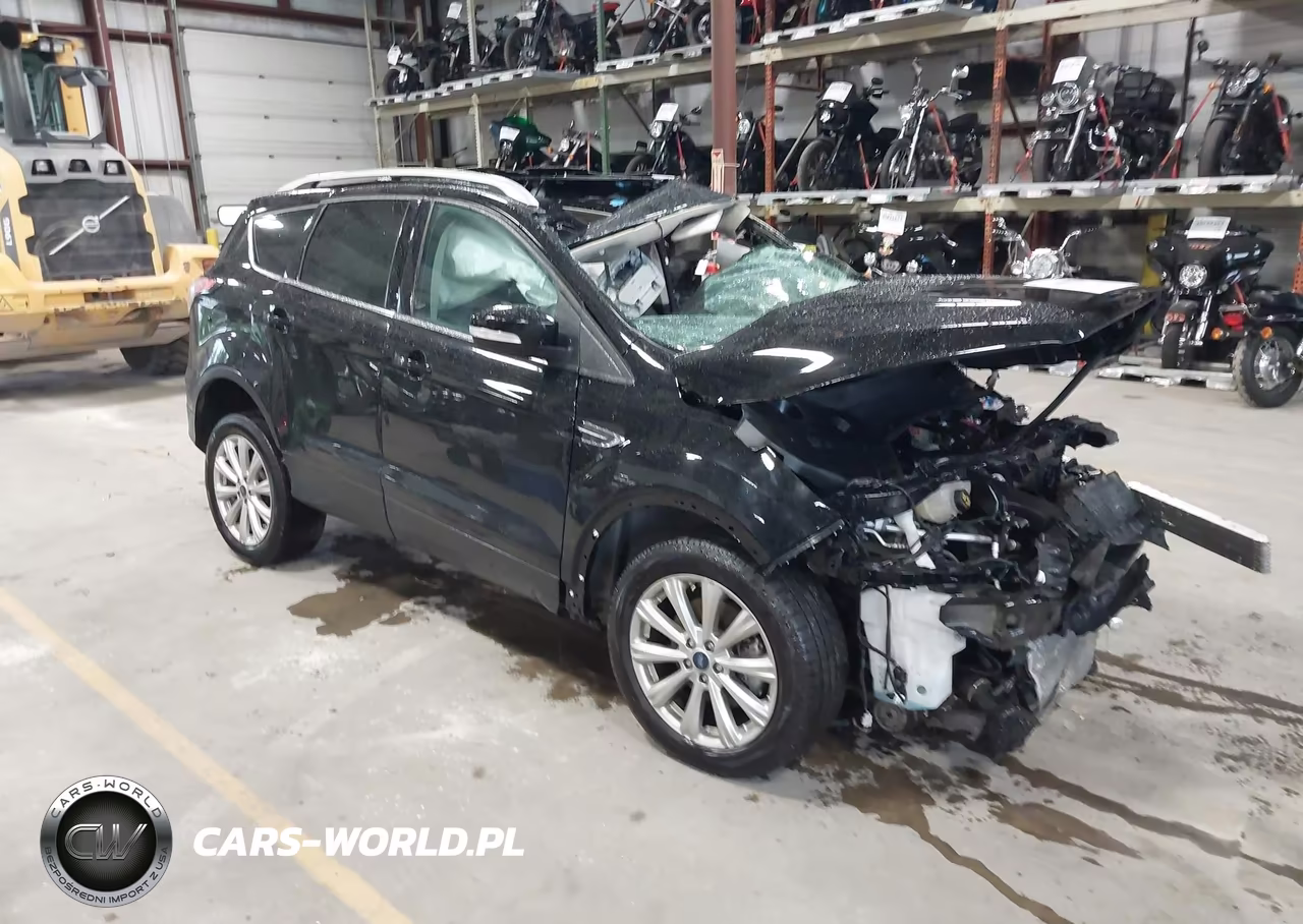 2017 Ford Escape Titanium VIN:1FMCU9J93HUD05785 - 1