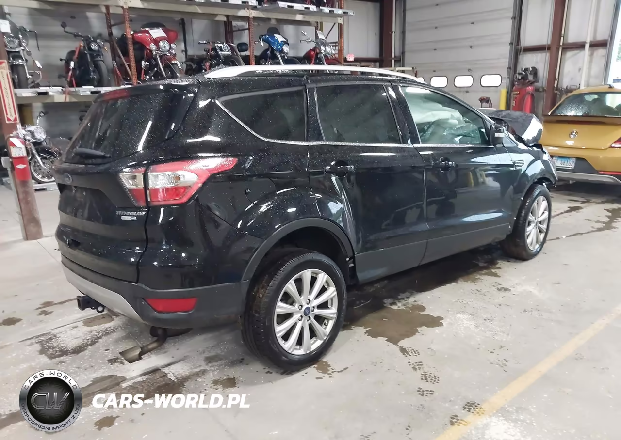 2017 Ford Escape Titanium VIN:1FMCU9J93HUD05785 - 4